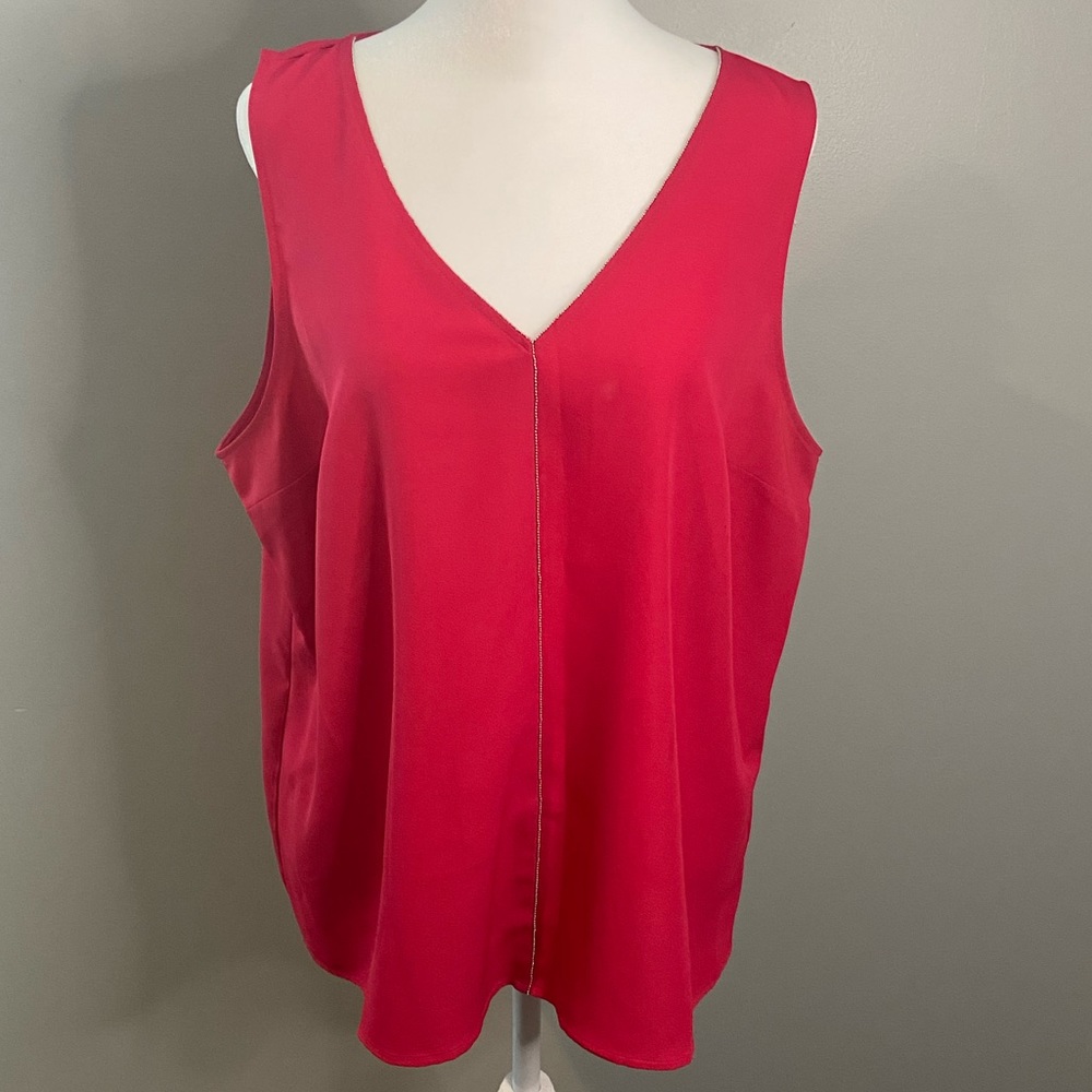 Jennifer Lopez hot pink sleeveless blouse